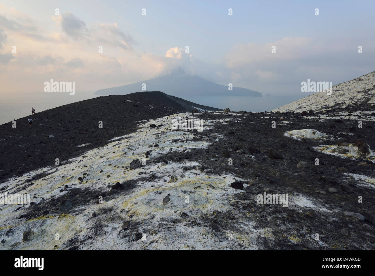 Tourists on the steep slopes of Anak Krakatau; Western Java, Indonesia. Stock Photo
