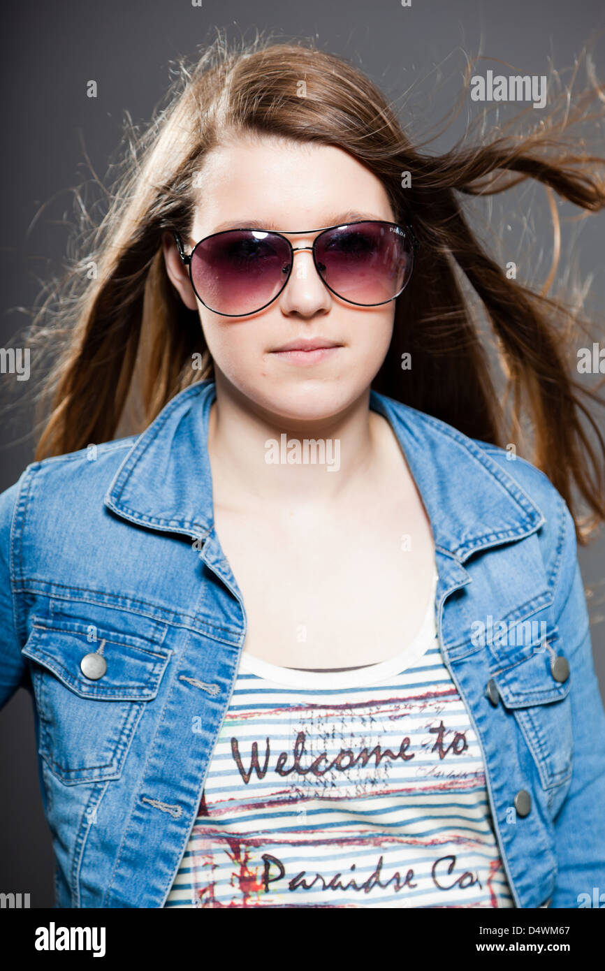 Teenage girl long hair glasses hi-res stock photography and images