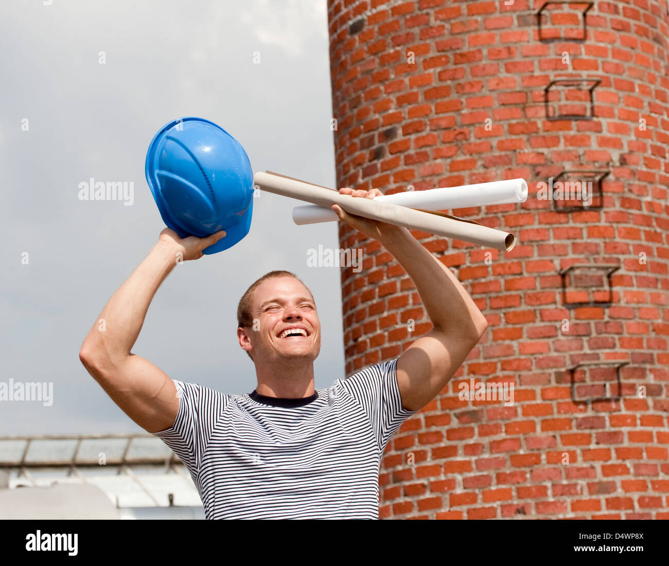 Young male architect celebrating his success Stock Photo