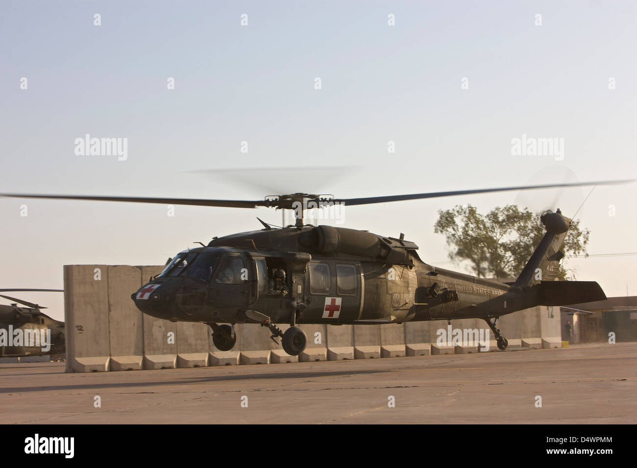 A U.S. Army medevac UH60 Black Hawk helicopter takes off from COB