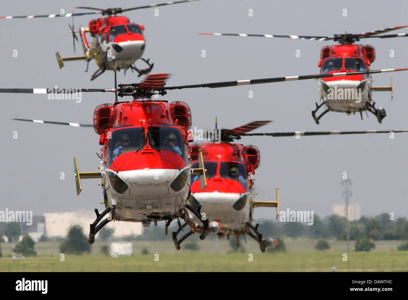 Indian Air Force Dhruv helicopters of the Sarang demo team, Berlin Schonefeld, Germany. Stock Photo