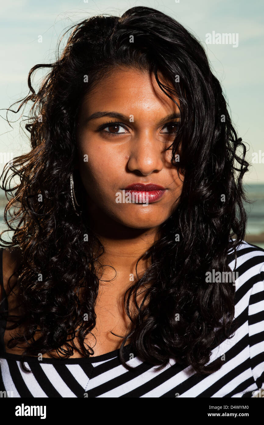 Pretty Indian Girl With Long Hair On The Beach In Summer Stock
