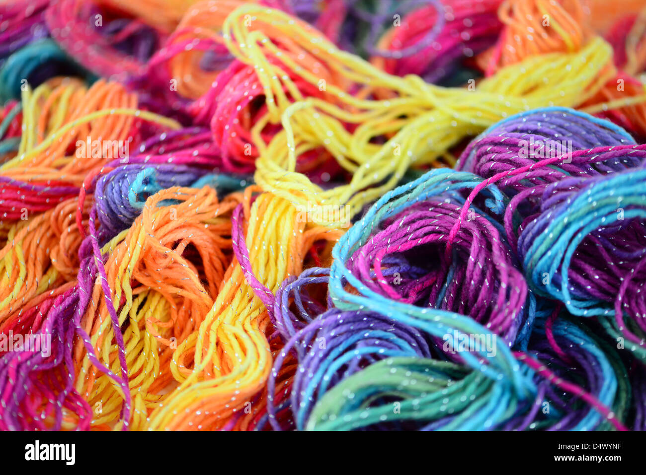 Background of bright yarn. Bright soft yarn multi colors Stock Photo