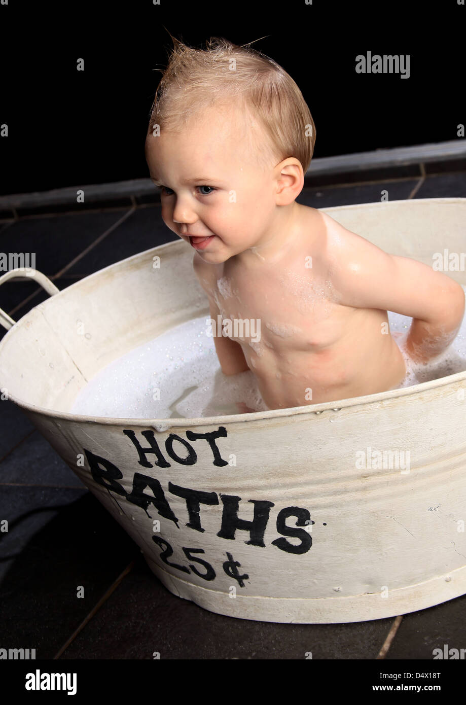 Bath time in a tin bath Stock Photo Alamy