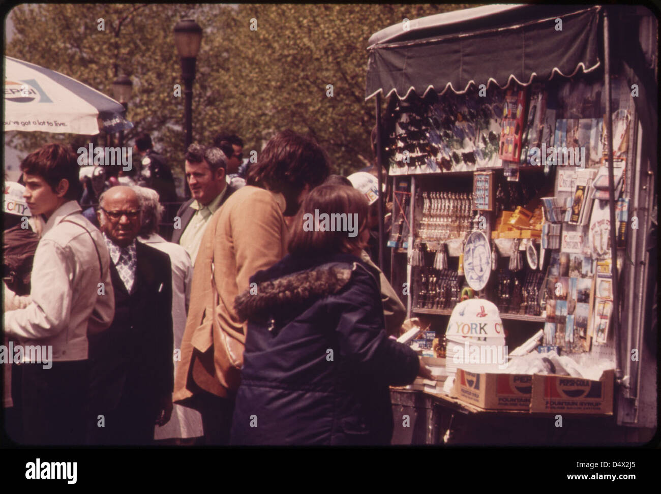 People Enjoying Memorial Day Holiday at Battery Park in Lower Manhattan 05/1973 Stock Photo