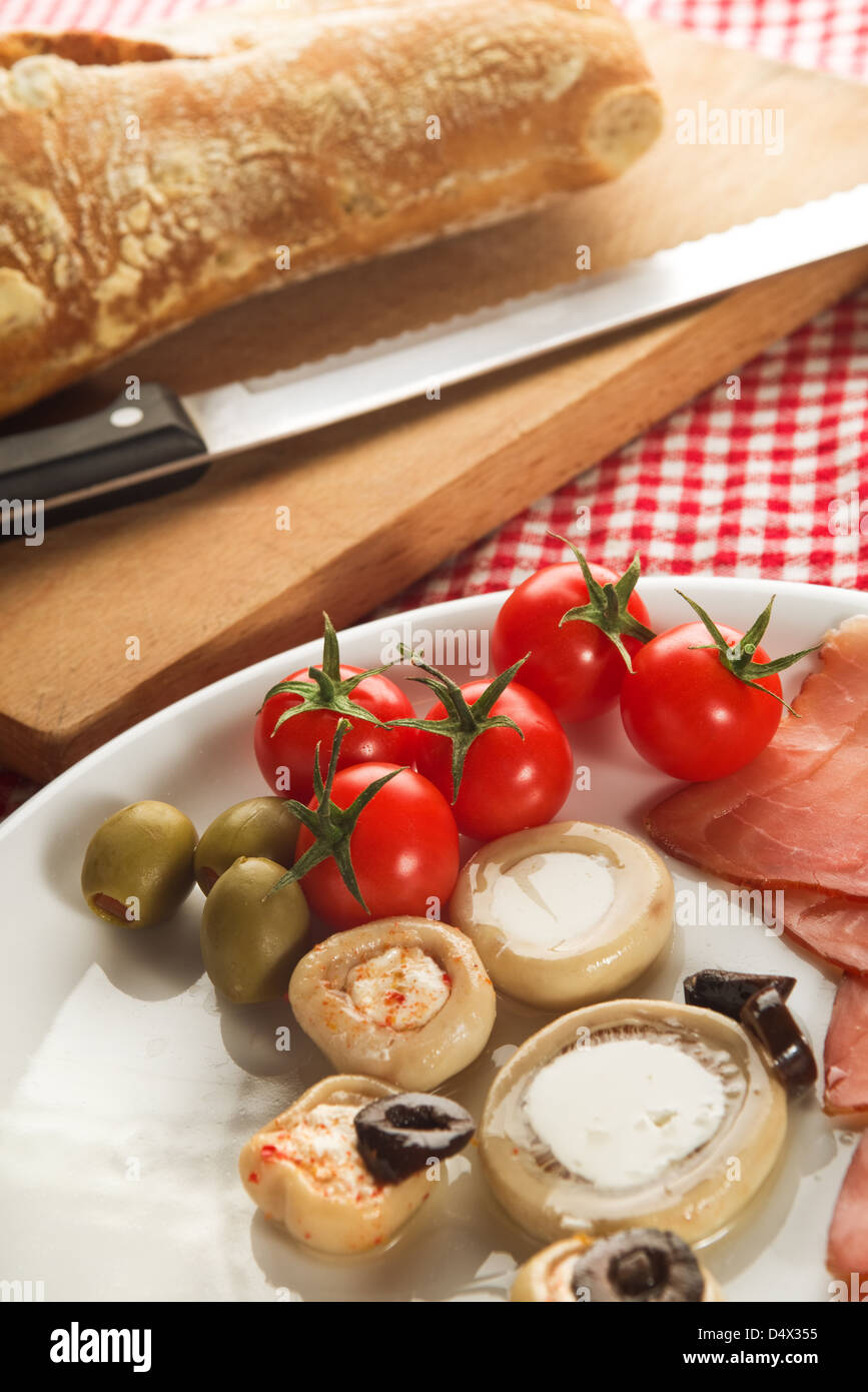 Cold appetizer, plate of assorted cold cuts traditional in mediterranean countries Stock Photo