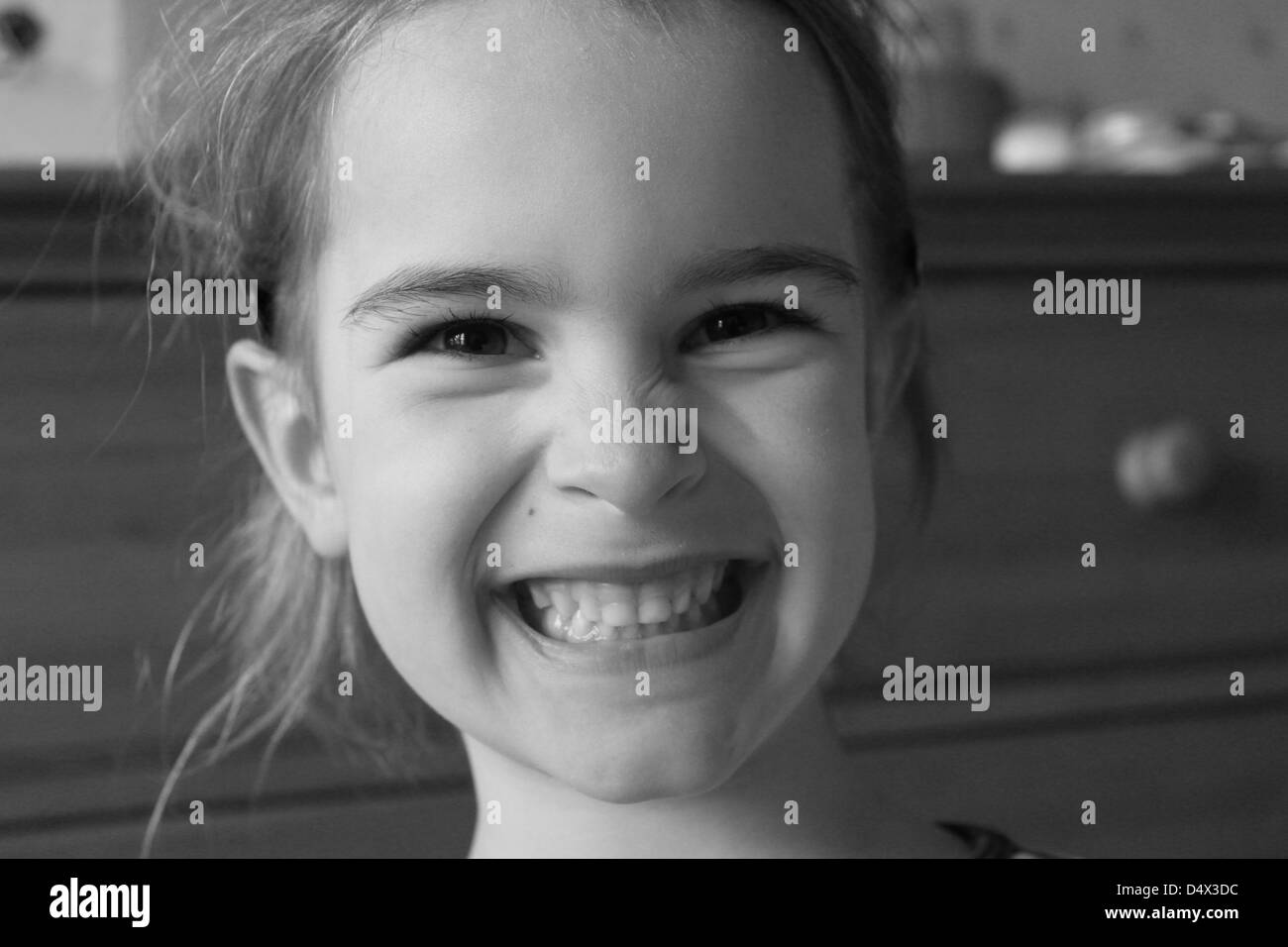 Young girl grinning Stock Photo