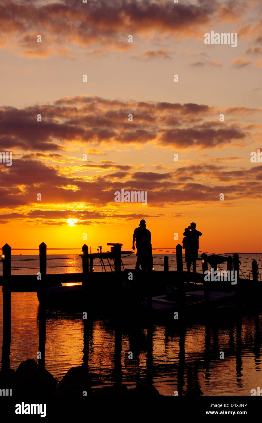 Family Watching Sunset in Florida Keys Stock Photo