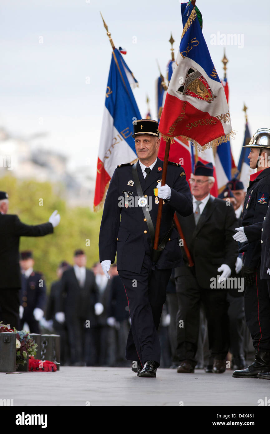 Parade of the Paris Fire Brigade - French Brigade des Sapeurs-Pompiers de Paris on Champs-Élysées and at Arc de Triomphe; Stock Photo