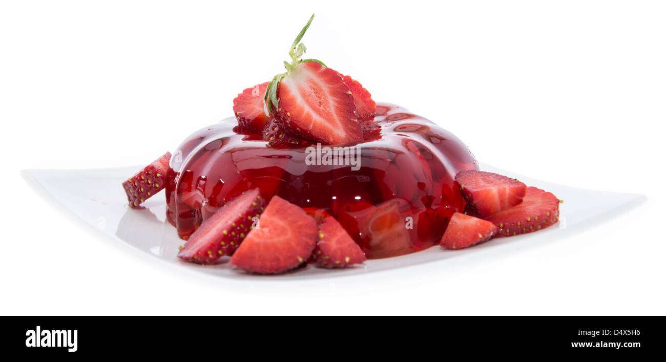 Fresh made Strawberry Jello with fresh fruits isolated on white Stock
