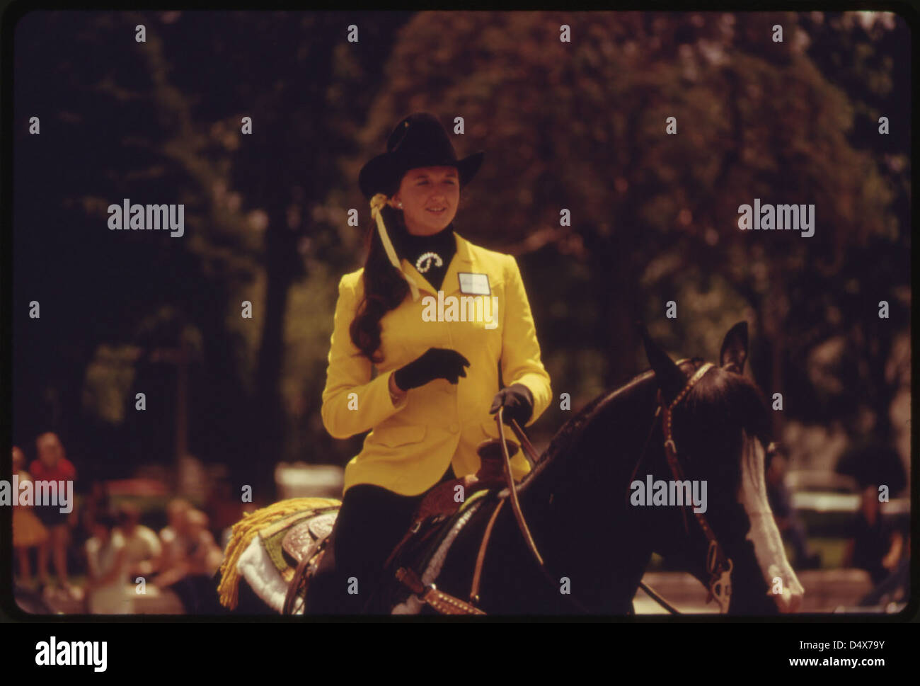 Rodeo Queen on Horseback During a Parade through the Town of Cottonwood