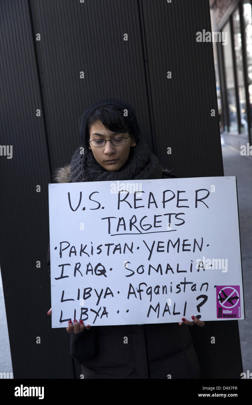 Americans demonstrate against L3 Communications, maker of Drone technology on 3rd ave. in NYC on the 10th anniversary of the American invasion of Iraq. Drone attacks routinely kill civilians and totally violate the national sovereignty of various countries. Stock Photo