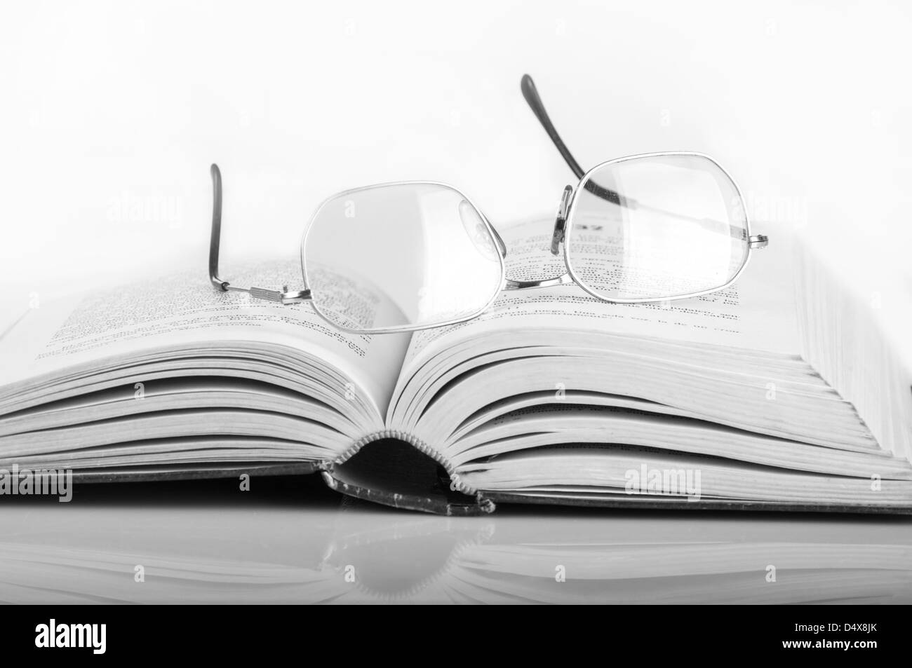 a pile of books and glasses Stock Photo