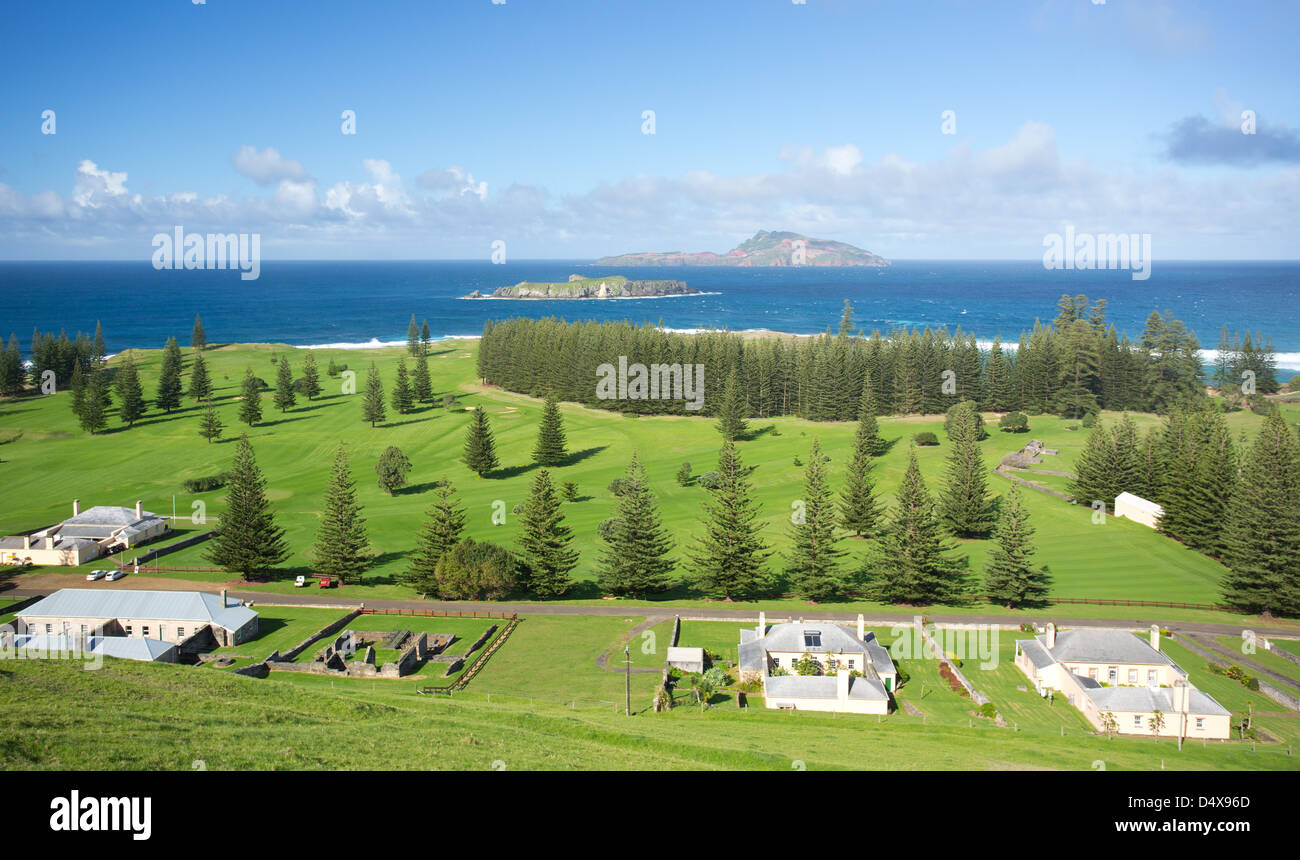 View of Quality Row with Philip Island and Nepean Island in the background, Norfolk Island, Australia Stock Photo
