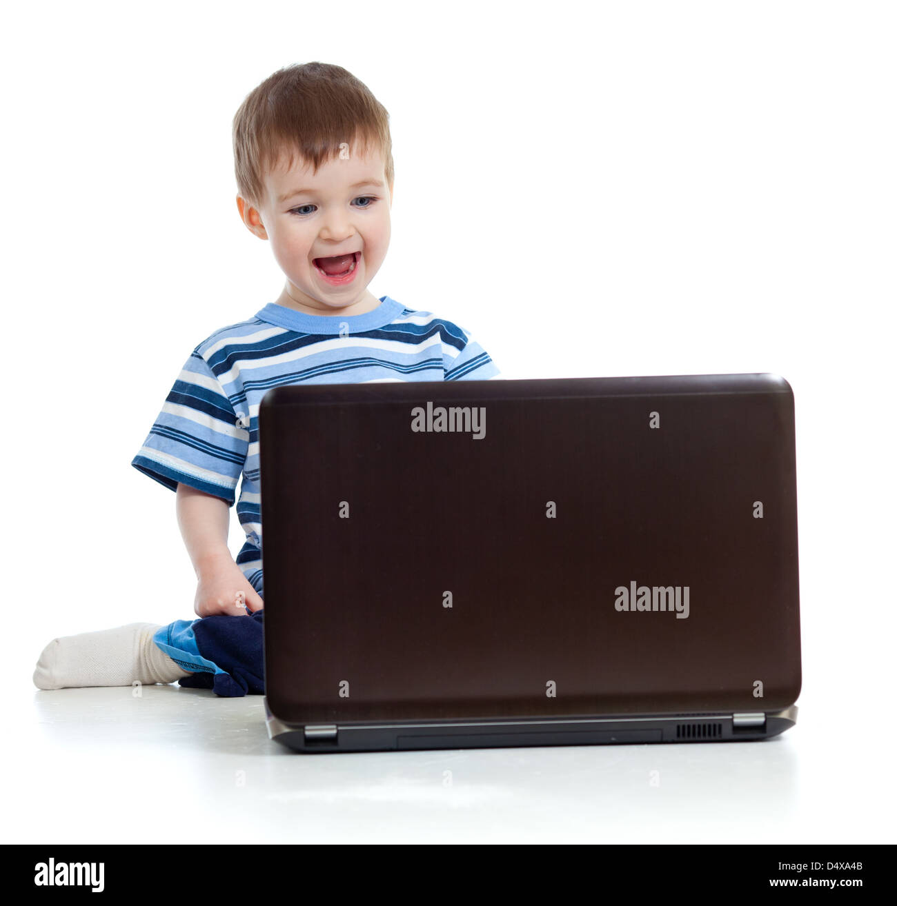 Child using a laptop Stock Photo Alamy