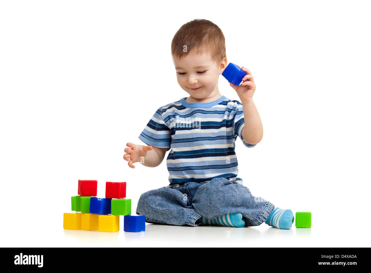 kid playing blocks