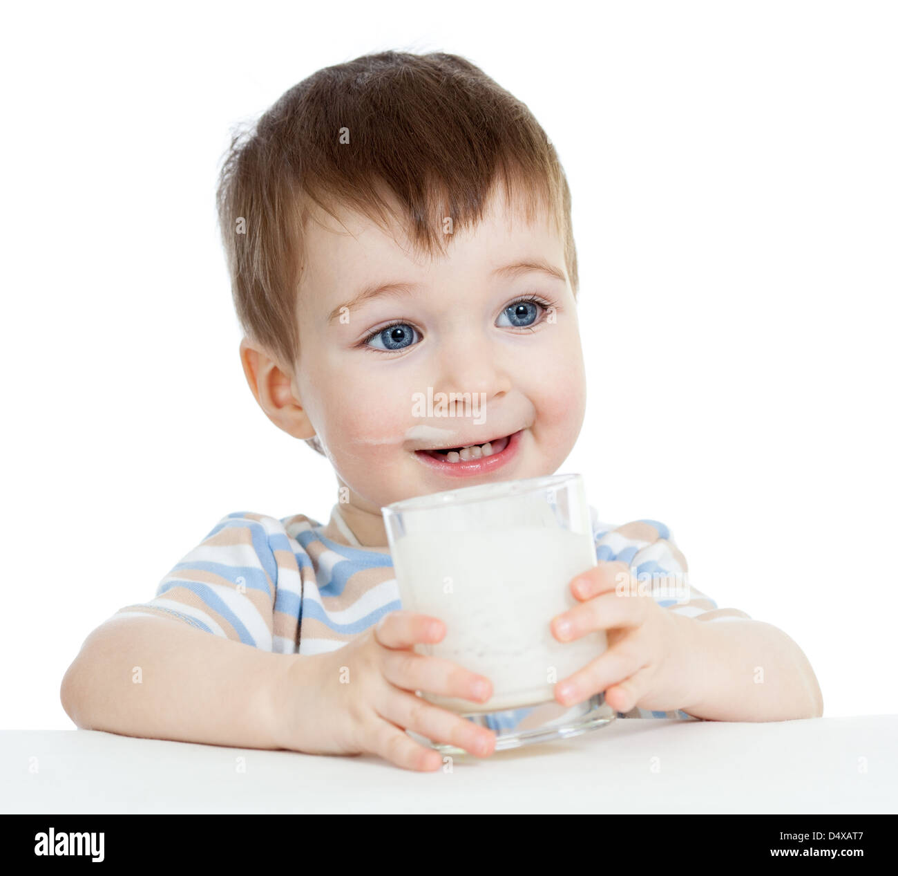 baby boy drinking yogurt or kefir isolated on white background Stock