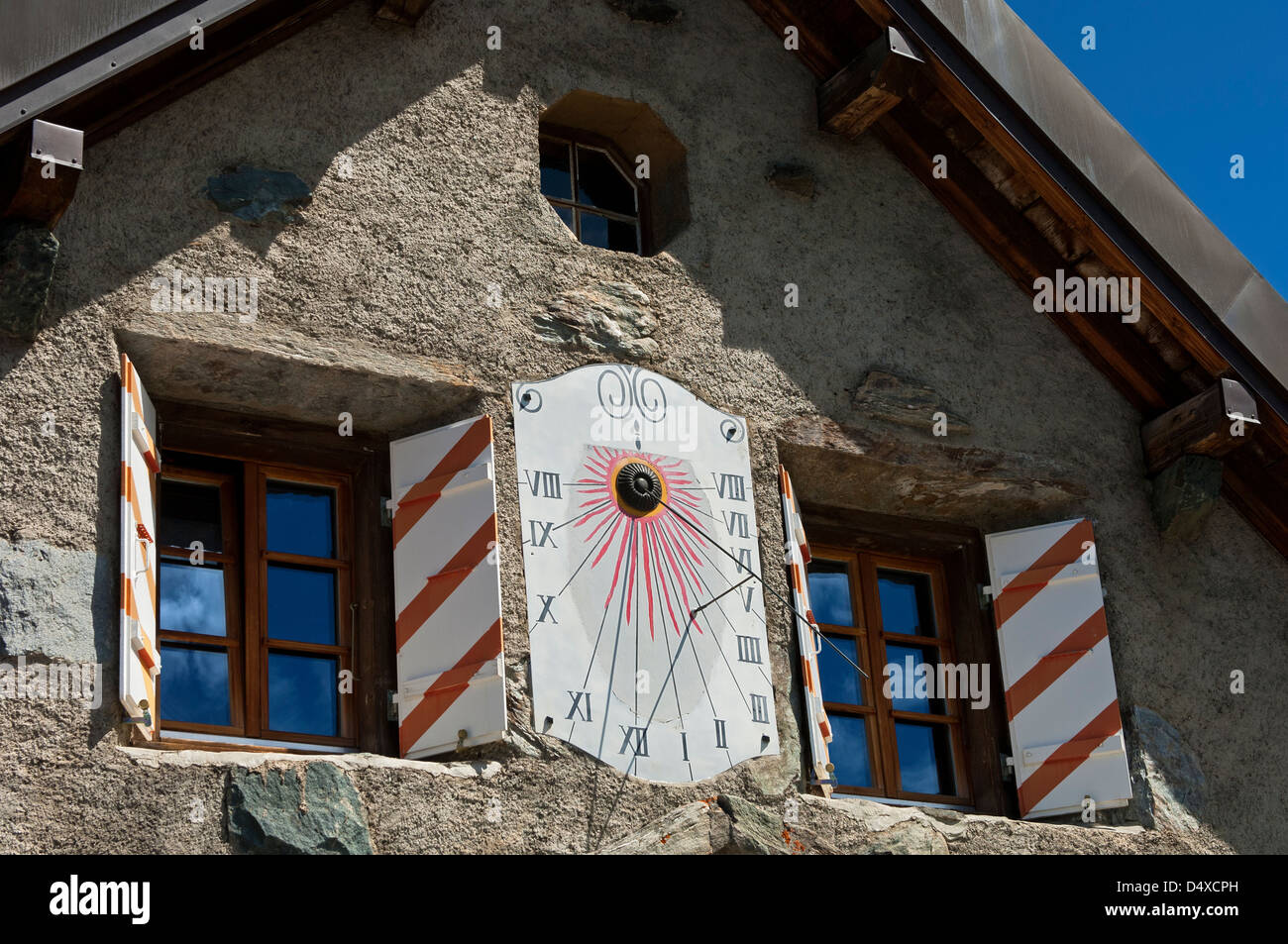 Sun dial at the gable of the mountain hut Cabane du Mont Fort of the Swiss Alpine Club (SAC), Verbier, Valais, Switzerland Stock Photo