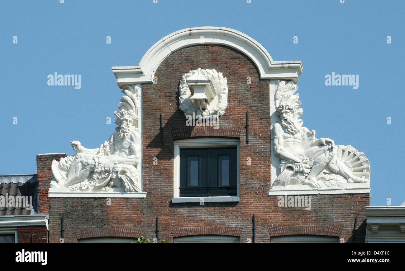 The Netherlands Holland Amsterdam Canal district Keizersgracht 695 neck gable 1701 Neptune Stock Photo