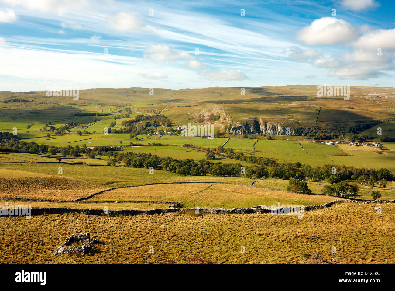 View across Wharfedale to Kilnsey village and crag, from Conistone Pie, Yorkshire Dales UK Stock Photo