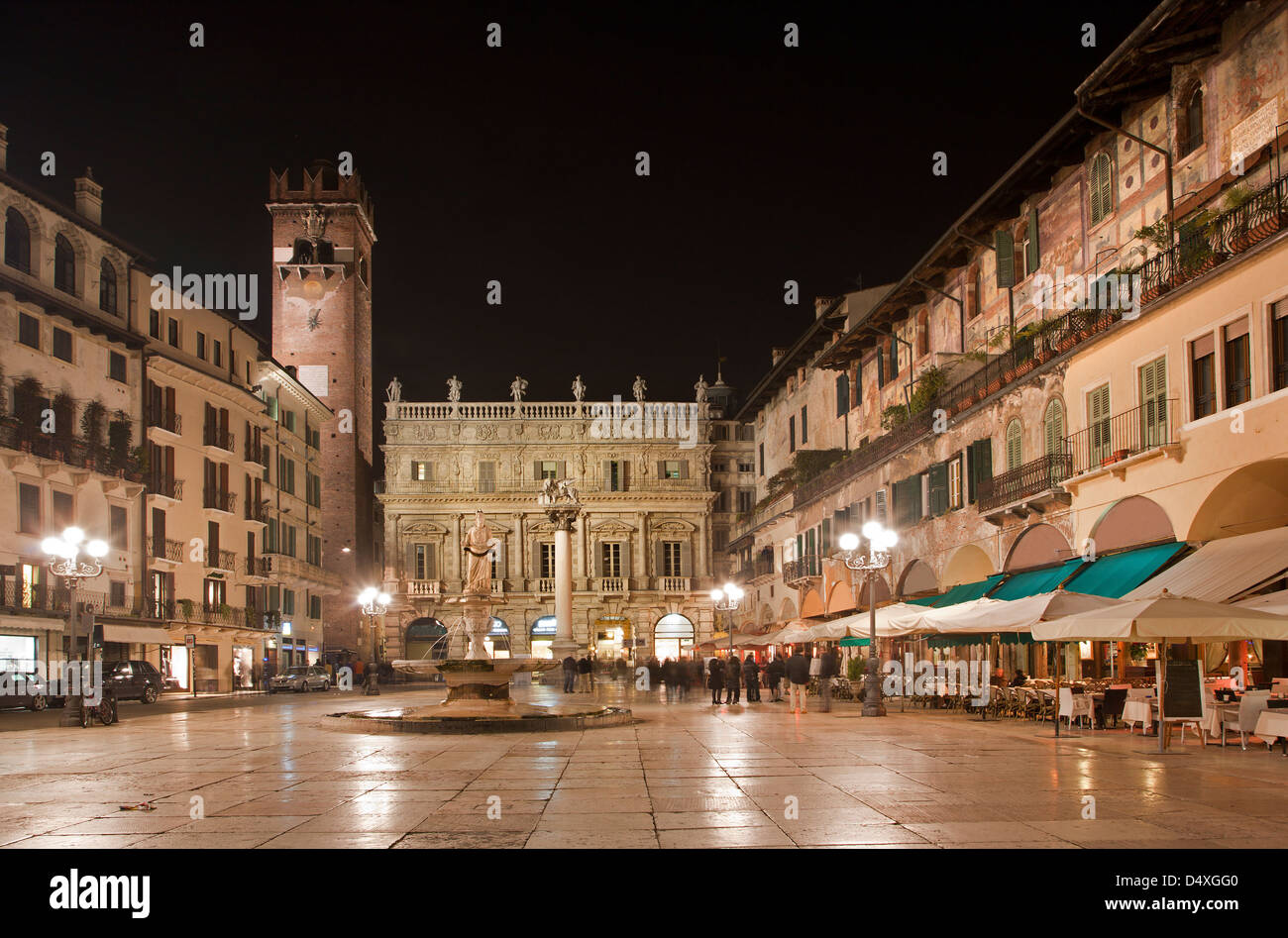 Verona - Piazza Erbe at night and Porta Leona and Palazzo Maffei in backgroud Stock Photo