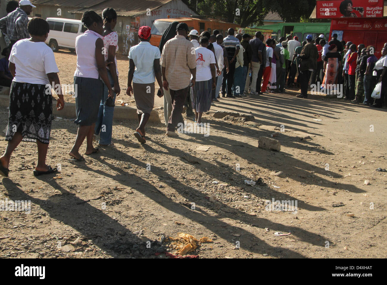 Voters queue and wait there turn to vote at Lions Health Clinic polling station in Mathare Constituency. © David Mbiyu/Alamy Live News Stock Photo