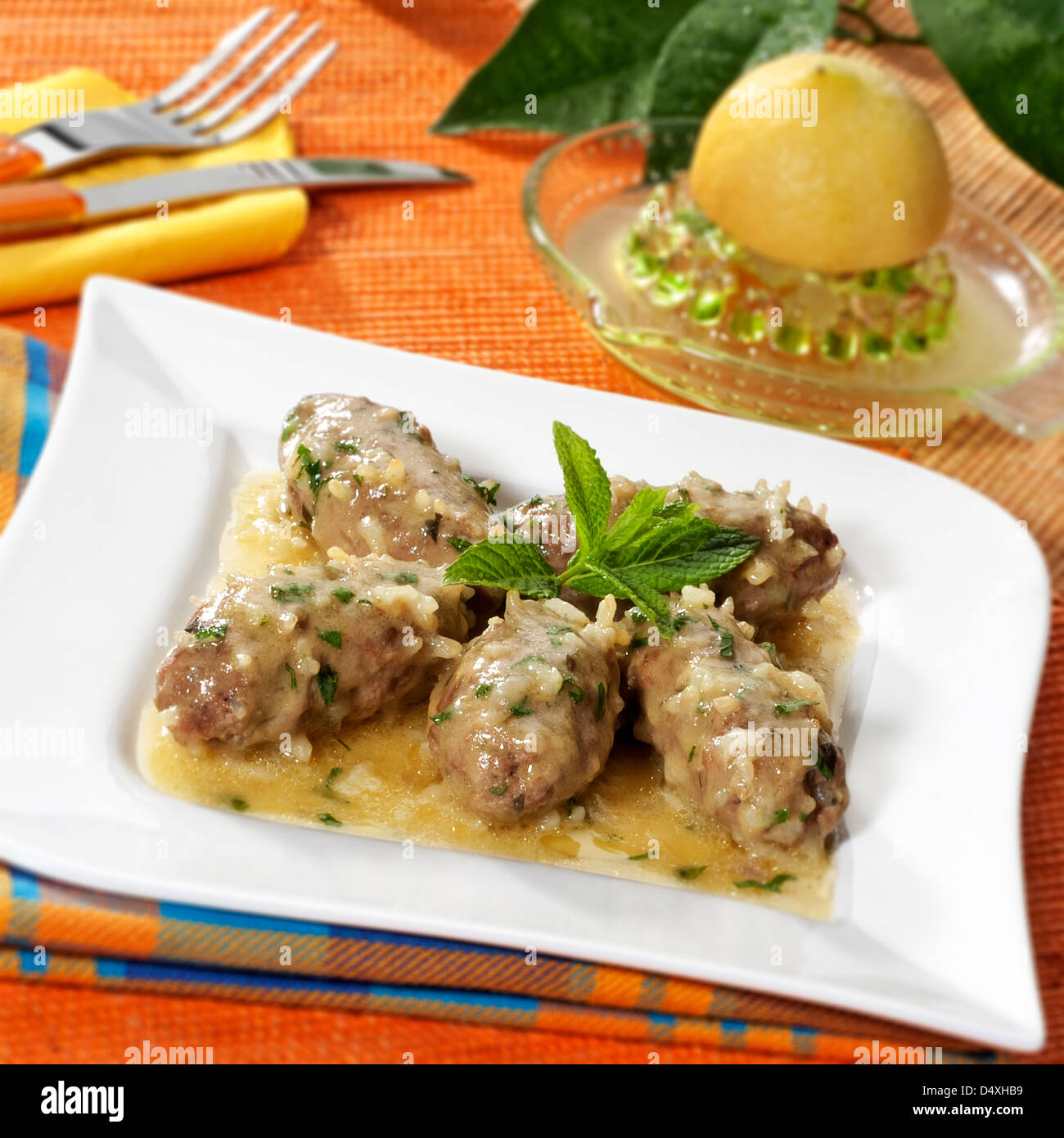 Rice meatballs in sauces Stock Photo Alamy