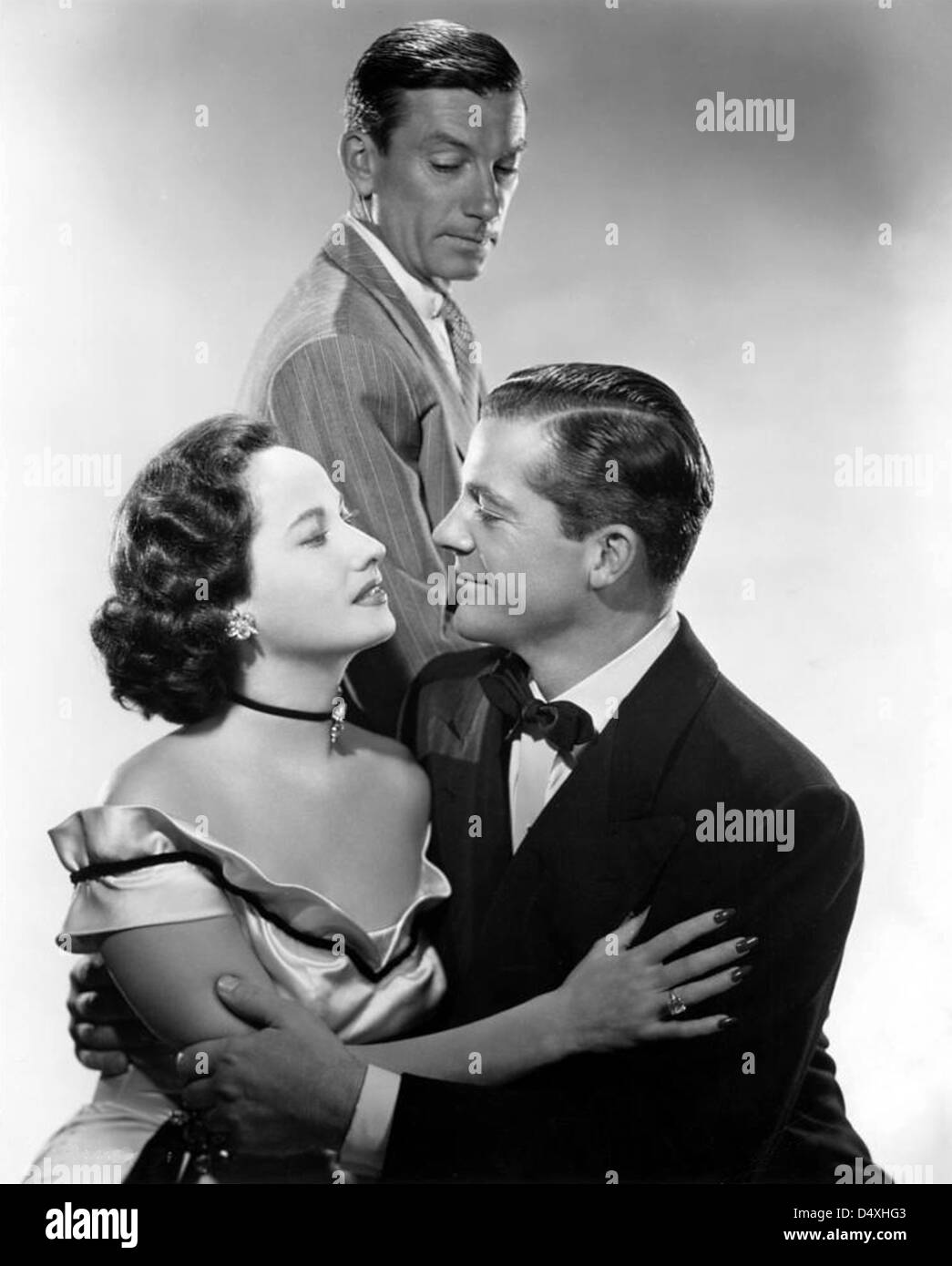 NIGHT SONG  1947 RKO Radio Pictures film with Merle Oberon, Dana Andrews at left and Hoagy Carmichael Stock Photo
