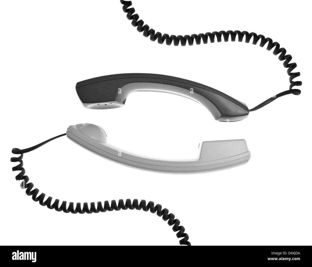 two handsets are talking isolated over white background Stock Photo Alamy