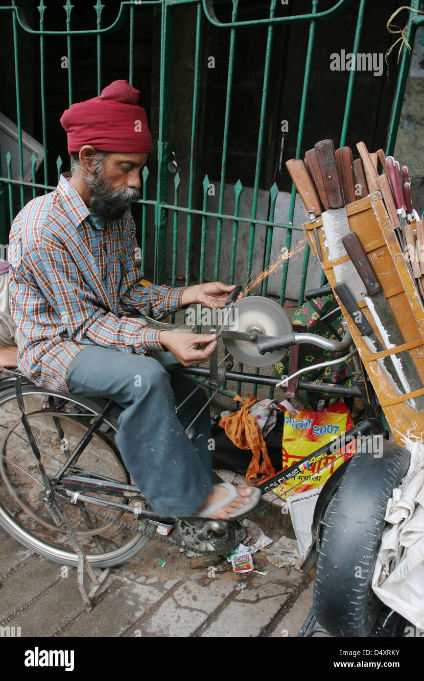 Knife sharpener on the Mall in Mussoorie. Stock Photo
