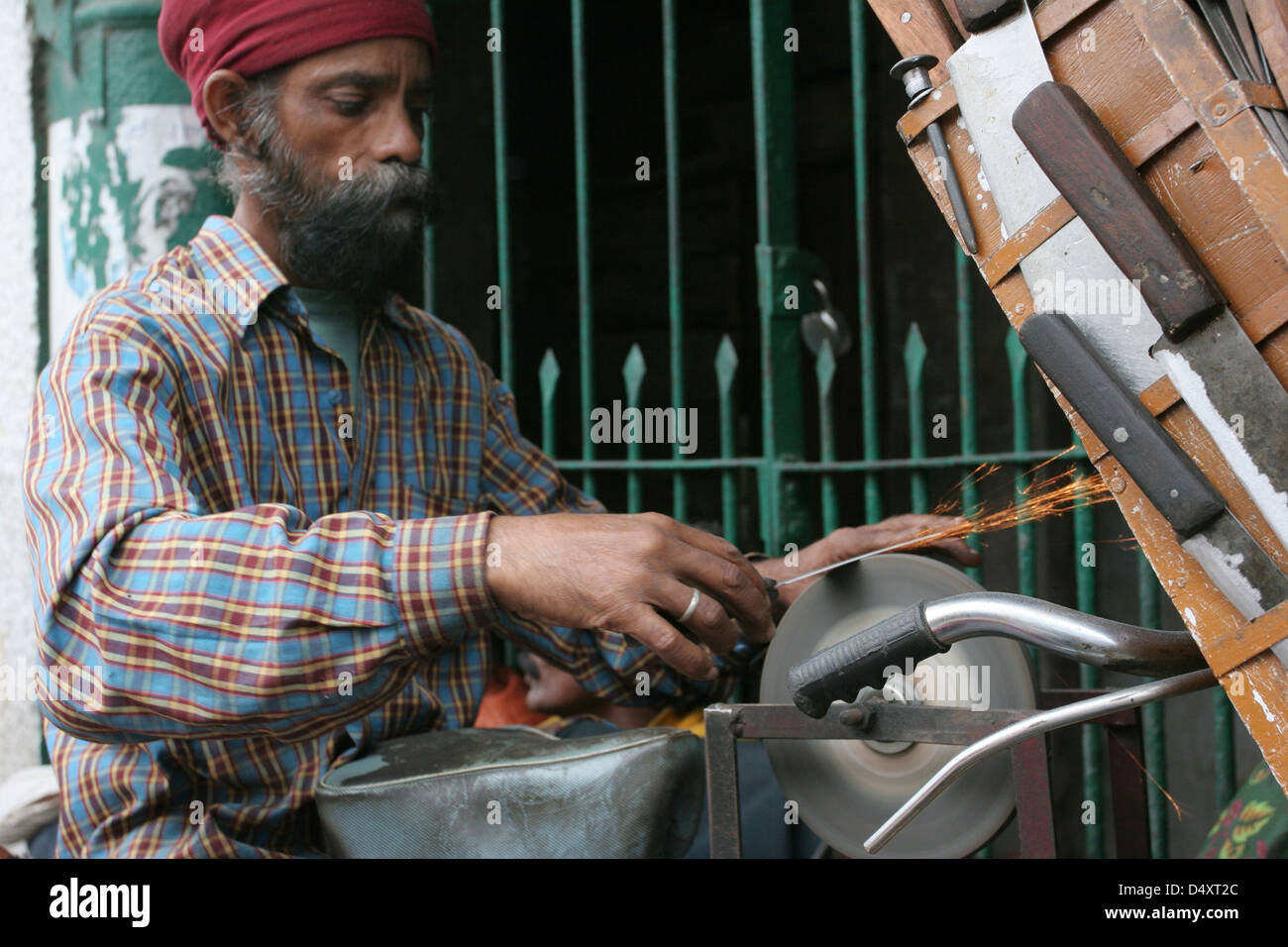Knife sharpener on the Mall in Mussoorie. Stock Photo