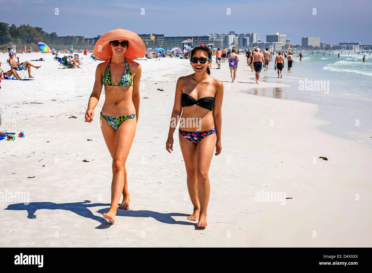 College girls enjoying the sunshine on Siesta Key beach Florida during Spri...
