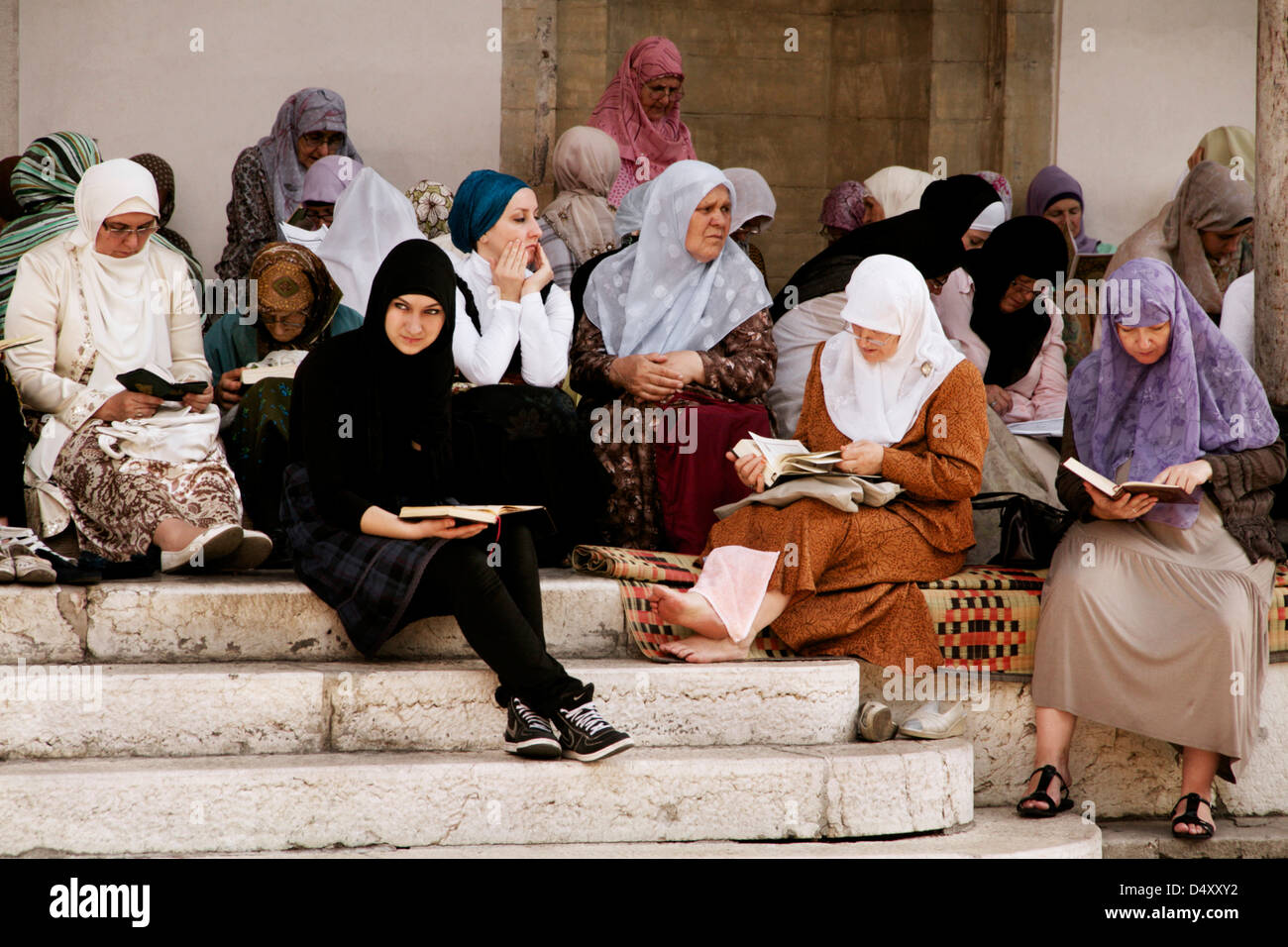 Gruop of women praying at the mosque of Gazi Husrev-beg Stock Photo