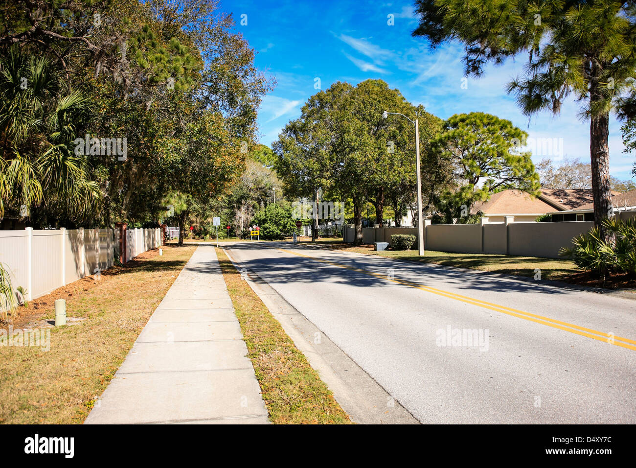 Street view and walled housing development in Sarasota Florida Stock