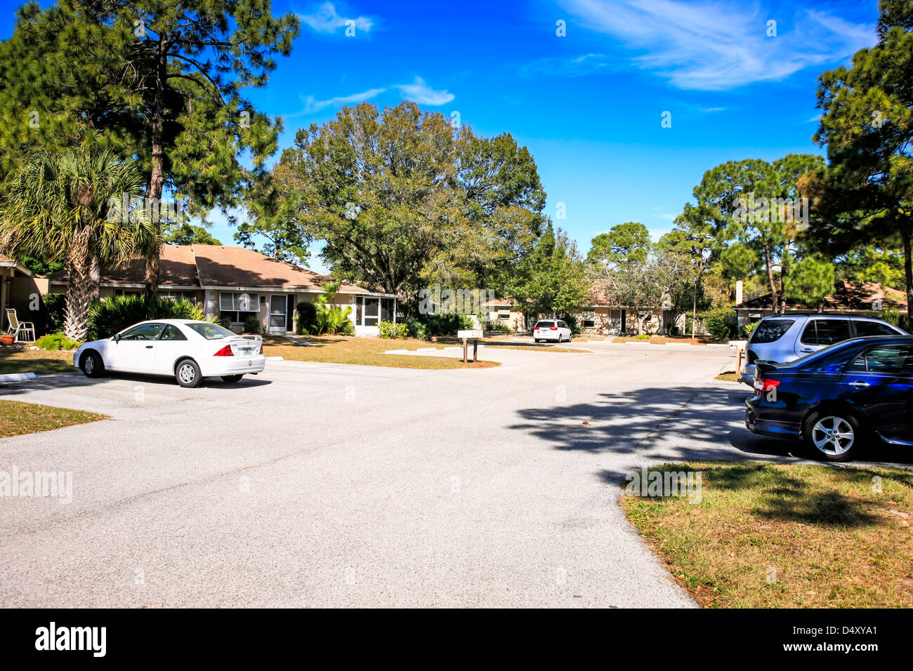 Street view and walled housing development in Sarasota Florida Stock Photo