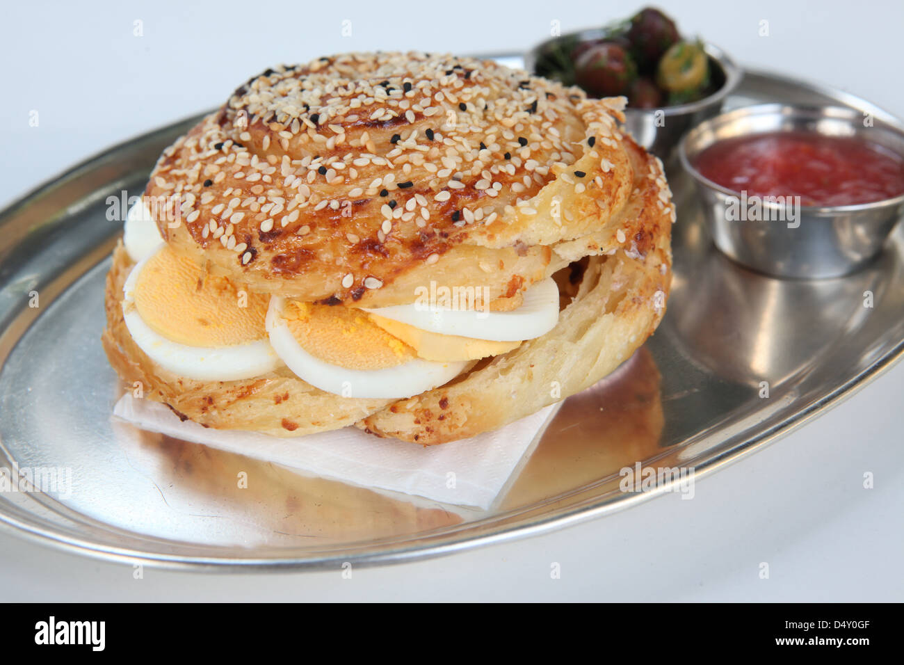 Borek (Also Burek) a Turkish pastry filled with cheese or potato or mushroom with hard boiled egg Stock Photo
