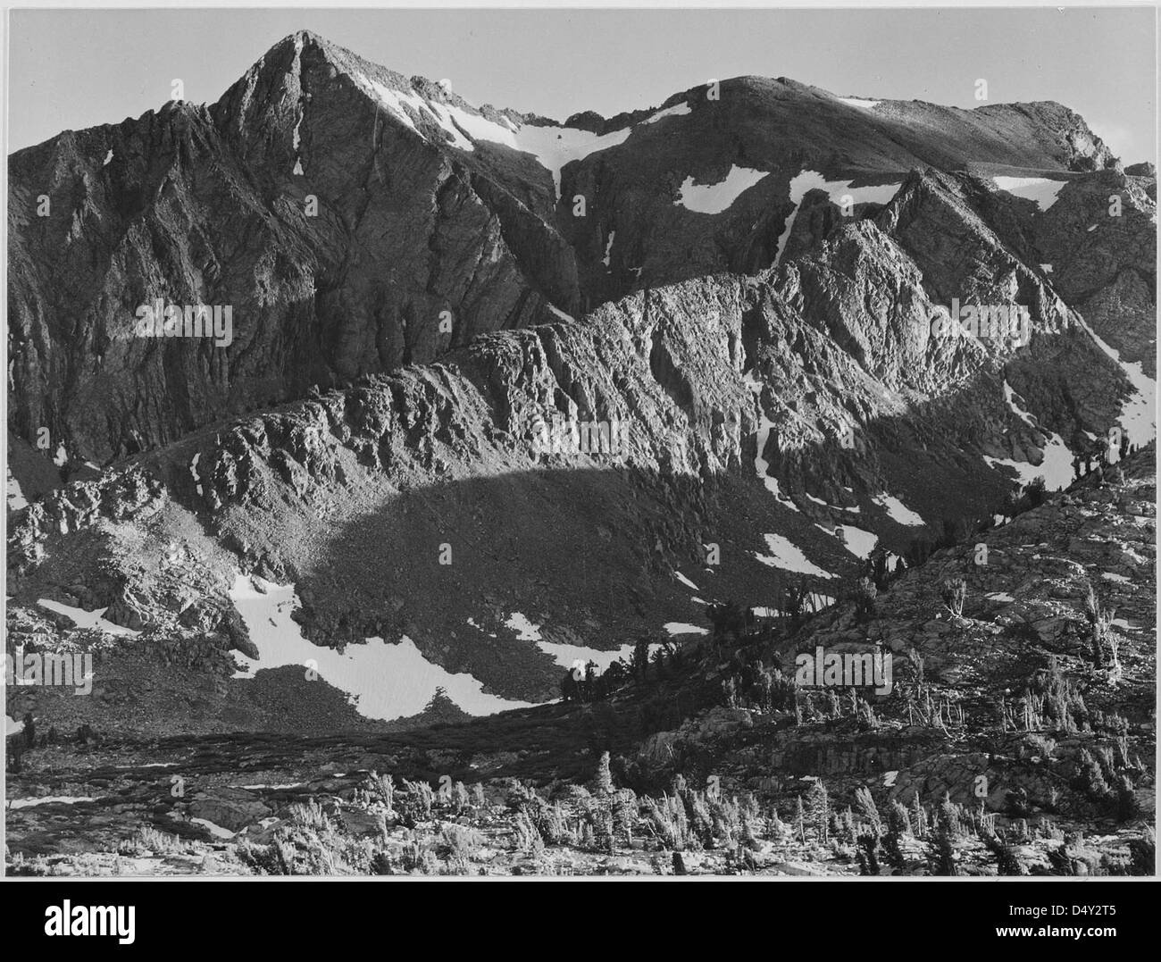 A 1936 photograph by Ansel Adams of a peak above Woody Lake in Kings ...