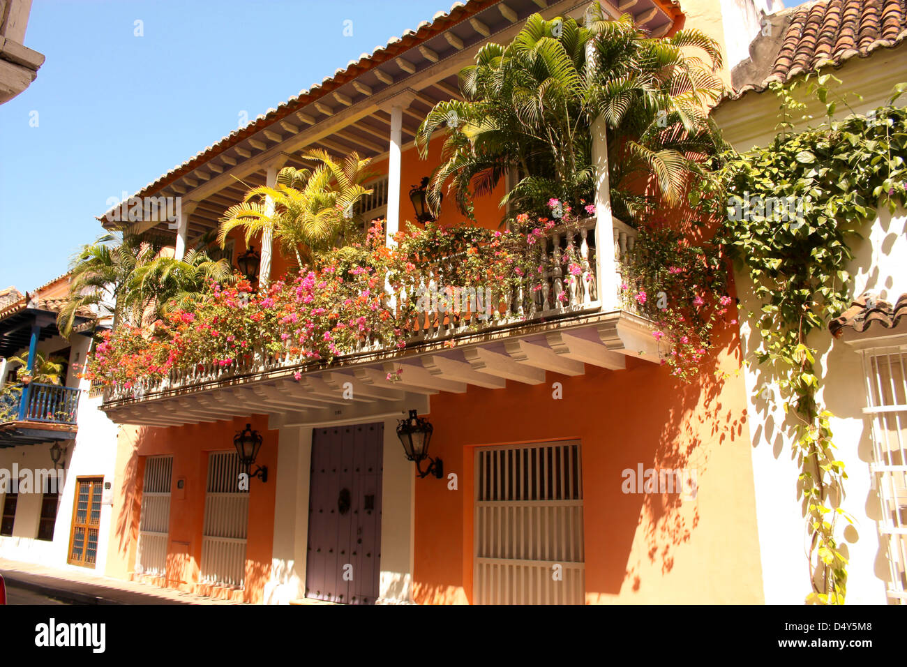 Detail of a colonial house. balcony with flowers. Spanish colonial home