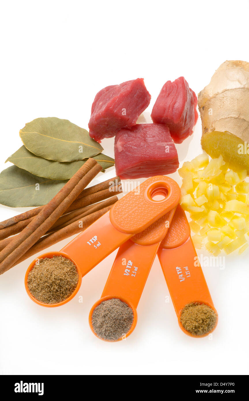 Beef curry ingredients on white Stock Photo Alamy