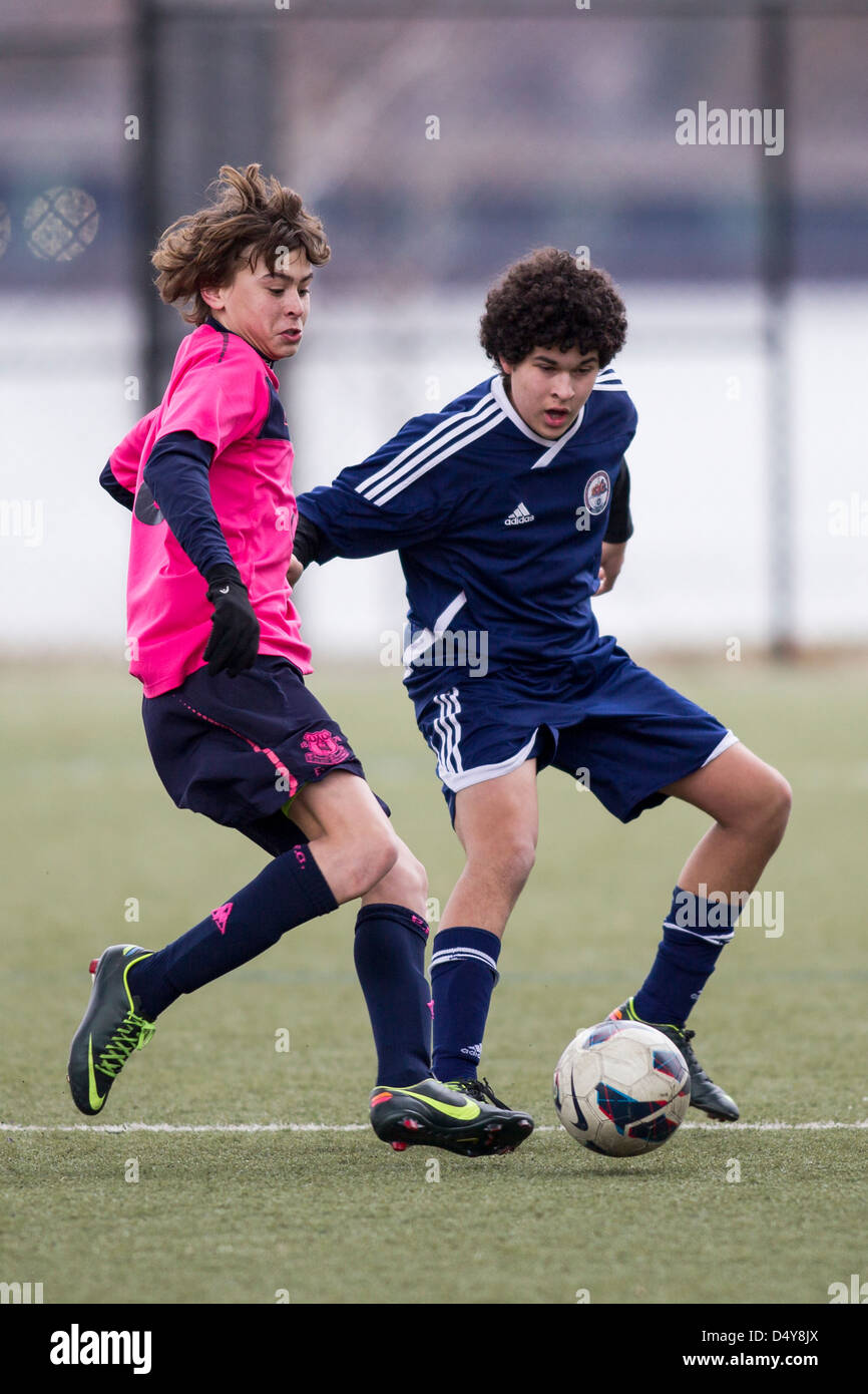 Teen boys soccer action. Stock Photo