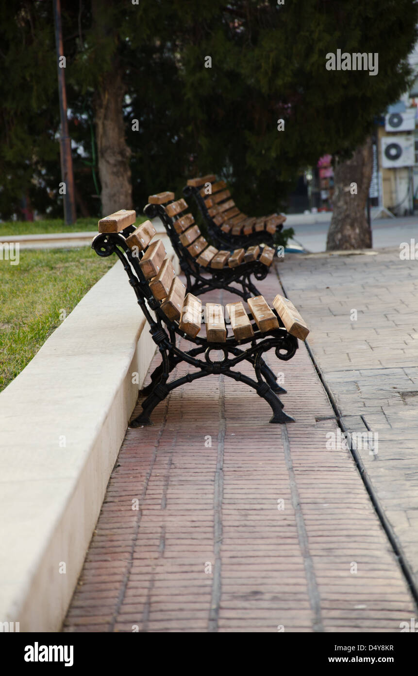Three empty benches in the park Stock Photo - Alamy