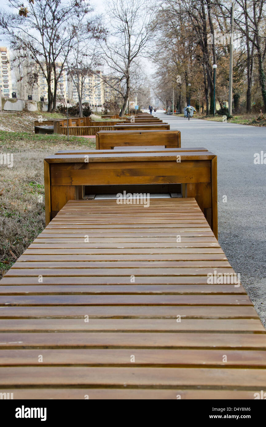 Empty wooden benches in the park Stock Photo - Alamy