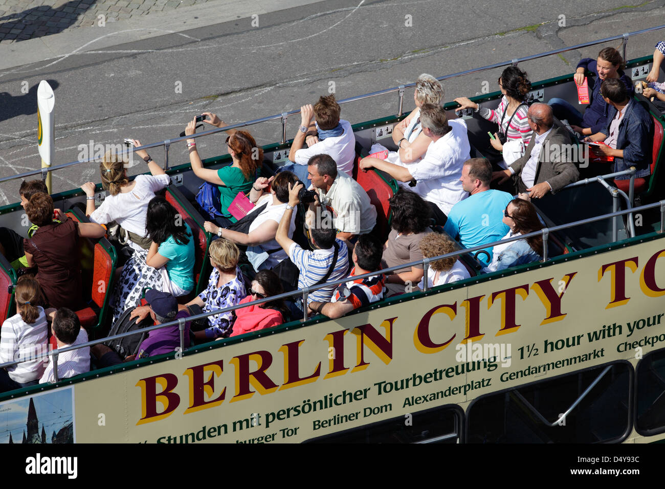 Berlin, Germany, tourists in an open double-decker bus for a city tour Stock Photo