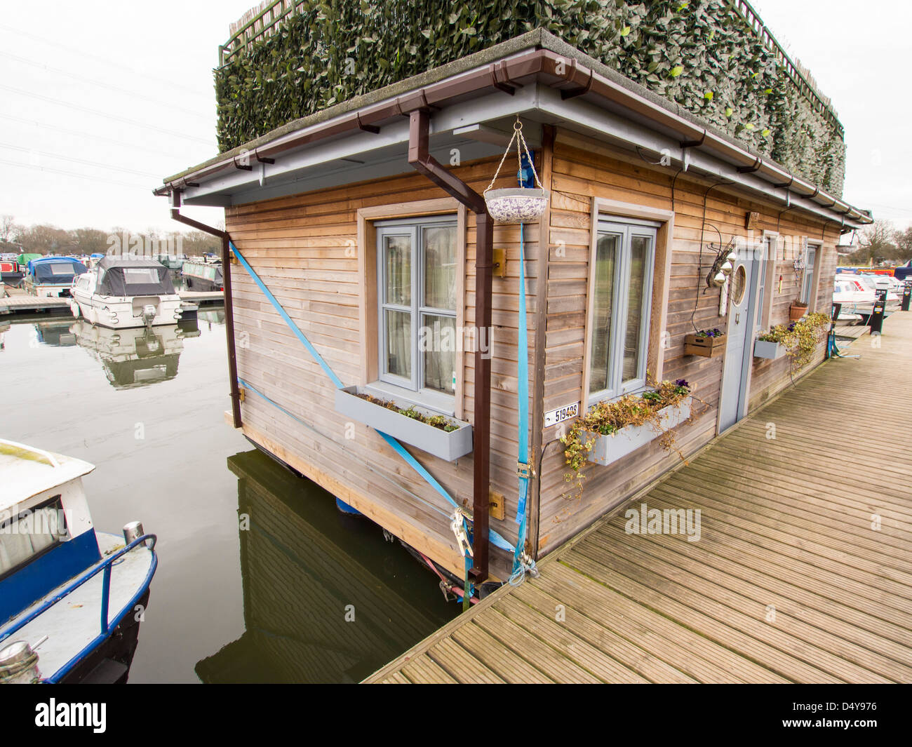 A floating house at Pillings lock, Barrow on Soar, Leicestershire, UK