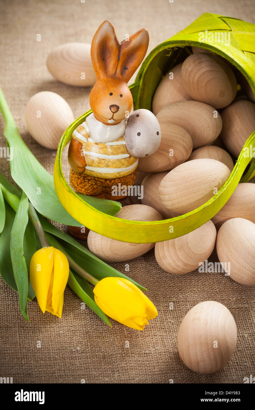 Easter decoration with rabbit, eggs and tulip Stock Photo - Alamy