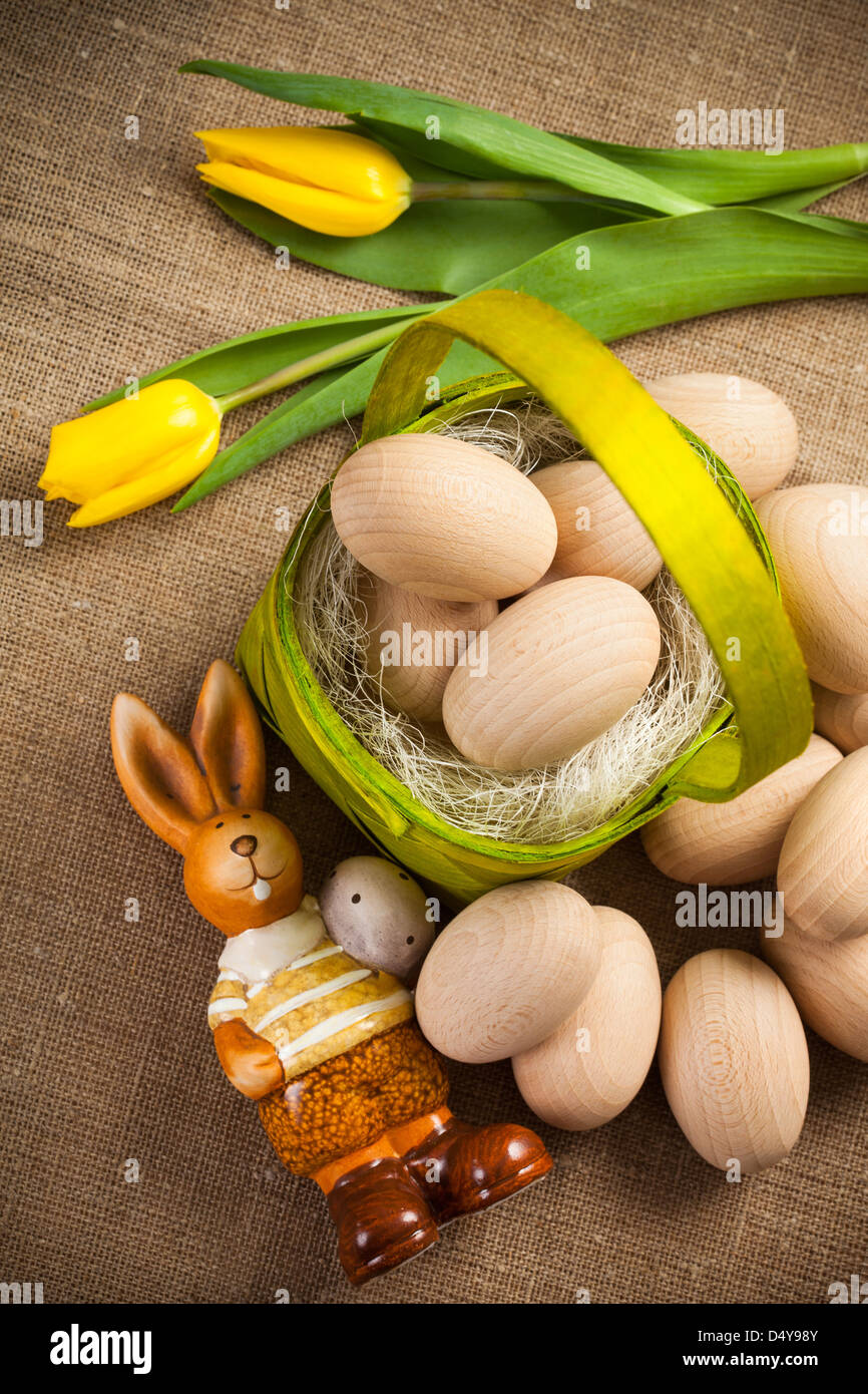 Easter decoration with rabbit, eggs and tulip Stock Photo - Alamy