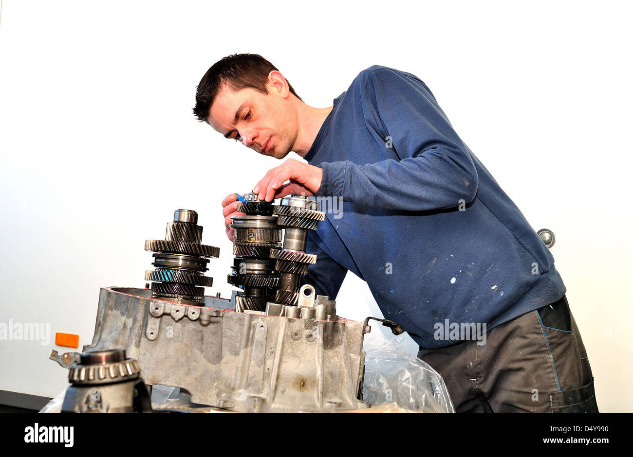 Man fixing car gearbox Stock Photo Alamy