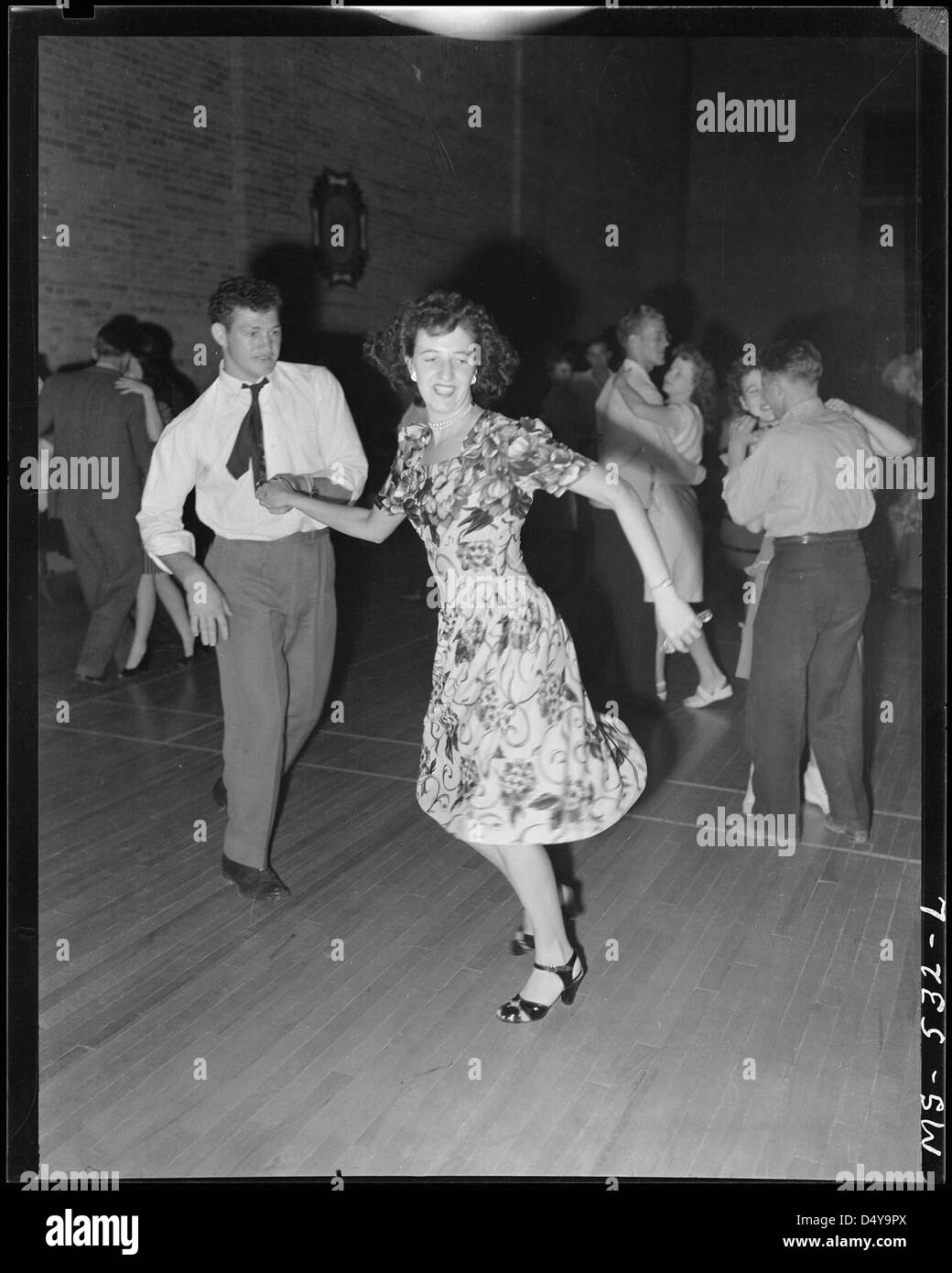 Young couple dancing at VFW dance on occasion of Fourth of July celebration. Price, Carbon County, Utah. Stock Photo