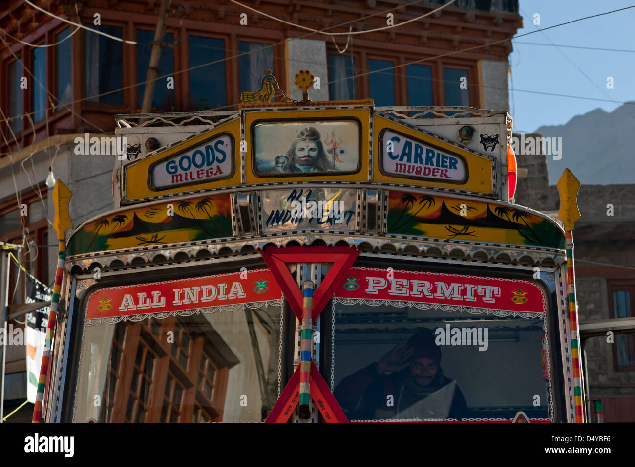A highly decorated HGV and driver in Leh Ladakh, Jammu and Kashmir, Northern India. Stock Photo