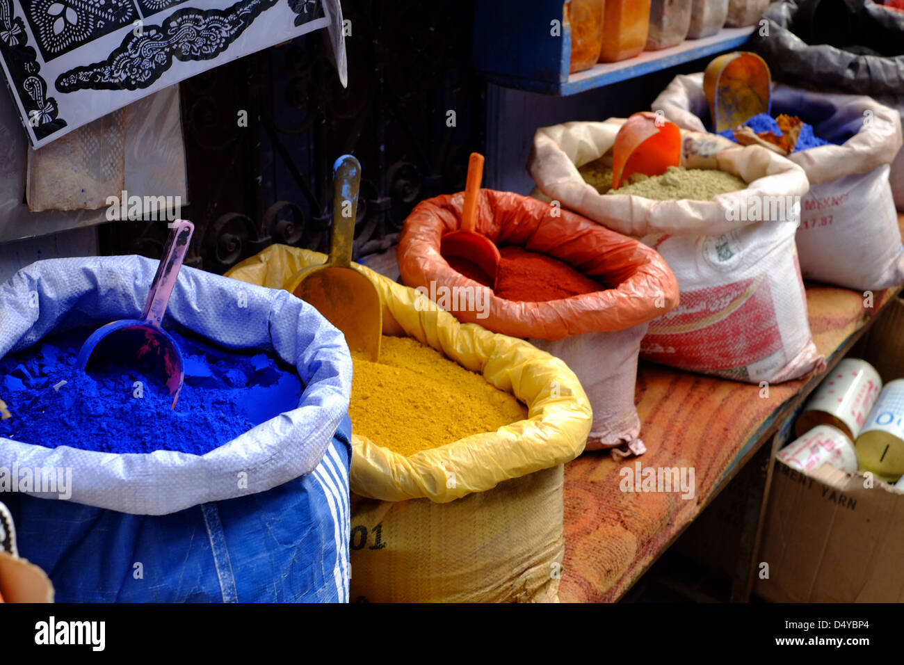 Paint dyes in sacks at a shop in the streets of Chefchaouen Morocco